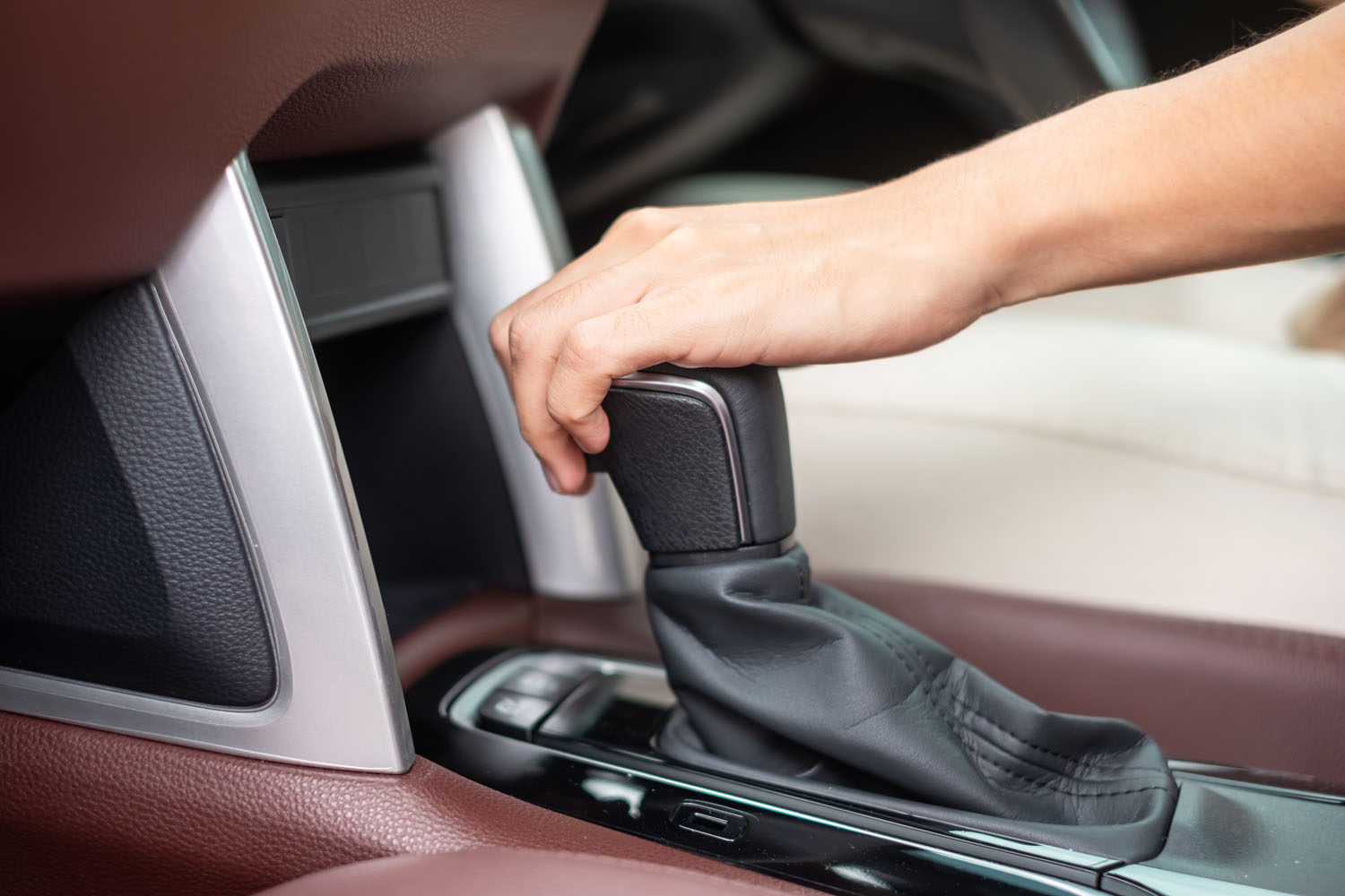 left hand on manual gearbox stick